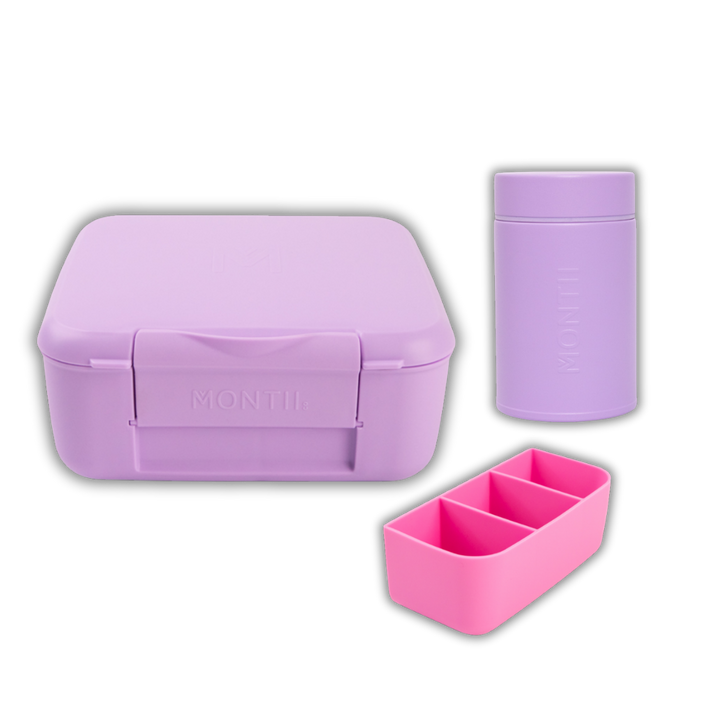 Purple lunch box, pink snack container, and small purple container on a white background