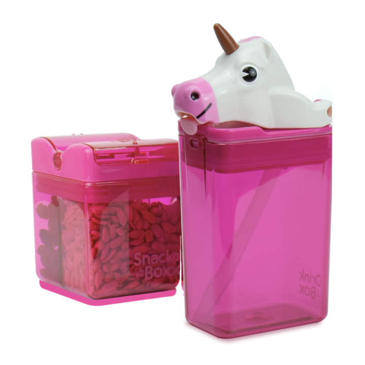 Pink snack container with a unicorn-shaped lid on a white background